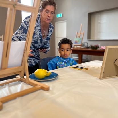 Painting together in the studio