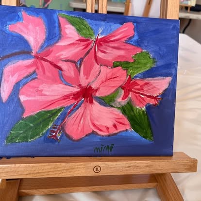 Pink hibiscus on a small easel