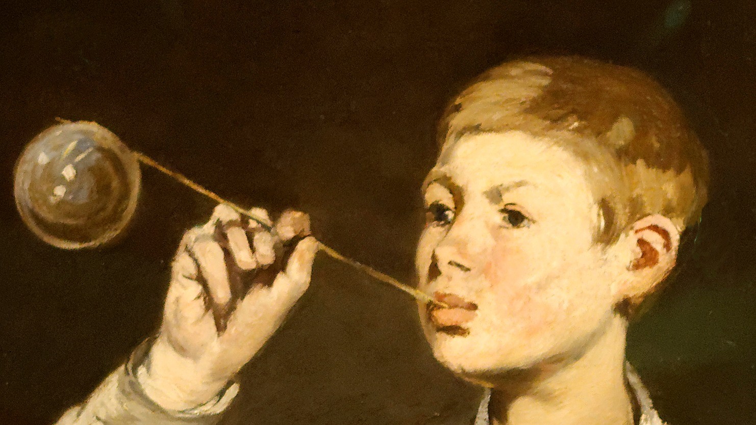 Boy Blowing Bubbles
